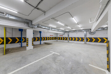 Empty underground parking lot or garage interior