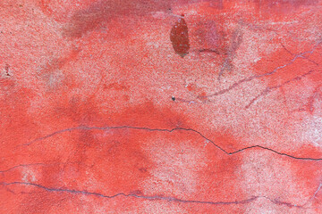 Old wall with deep cracks. Texture of stone and broken concrete. Grunge texture of ruined wall.