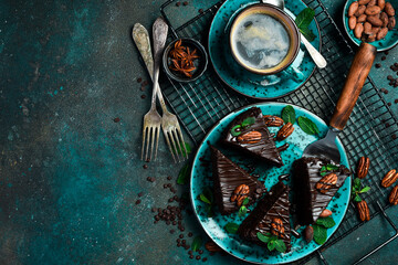 Chocolate brownies plant based cake made with sweet potato. Cup of coffee. Sweets and chocolate. Top view.