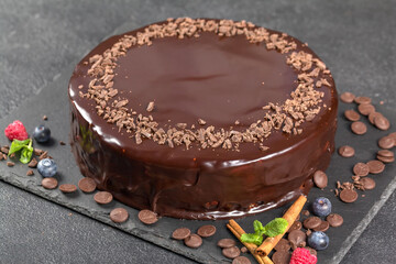 Cake decoration. Chocolate glaze. Chocolate chips