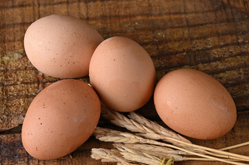 natural chicken egg on the wooden table, rustic free-range chicken natural farm food