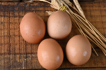 natural chicken egg on the wooden table, rustic free-range chicken natural farm food