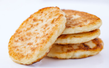 Pancakes stacked, flour sweet confectionery, side view, selective focus