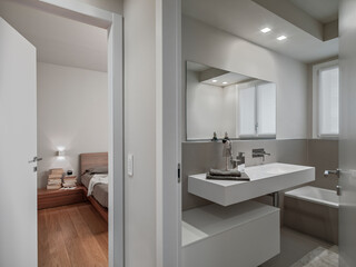 Naklejka na ściany i meble Interior of a modern bathroom and bedroom view