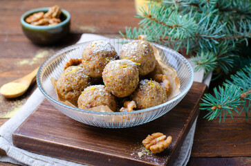 Walnut Energy Balls, Healthy Candies on Wooden Background
