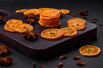 Dried round shape slices of bright orange color tangerine