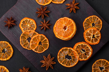 Fototapeta na wymiar Dried round shape slices of bright orange color tangerine
