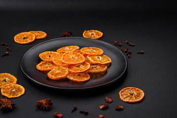 Dried round shape slices of bright orange color tangerine