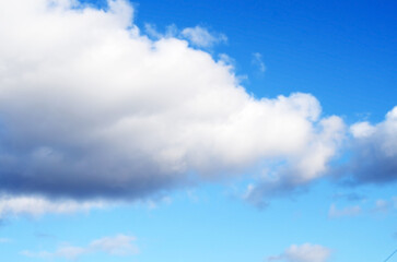 blue sky and white clouds. Clouds floating in the sky. cloudy blue background.