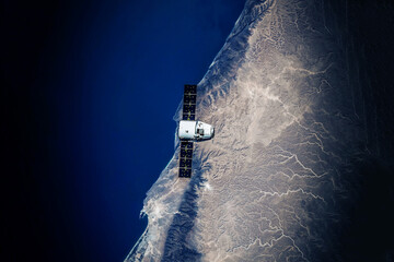 Spaceship in flight over the Earth. Elements of this image furnishing NASA. © Artsiom P