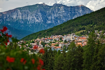 The town of Folgaria and Mount Cornetto in the background. Alpe Cimbra, Trentino, Italy.