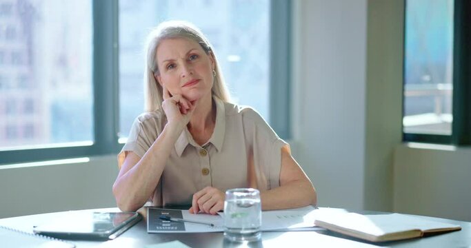 Business, face and senior woman thinking in office, confident and planning for marketing campaign. Mature female, employee and ceo with target, prepare for corporate deal and goal in workplace.