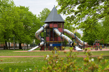 Children's attraction with slides in the city park