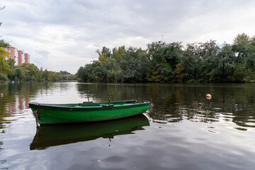 Small rowing boat on the Pisuerga river Valladolid-Spain
