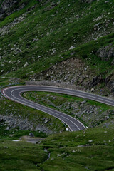 VIew from above, panoramic view of Transfagarasan Road, Romania. Beautiful fog covered mountain view during chill summer.