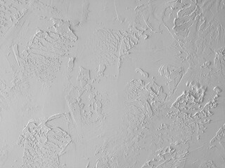 Art plaster, close-up. Decorative stucco texture for publication, design, poster, calendar, post, screensaver, wallpaper, postcard, banner, cover, website. Gray toned high quality photo