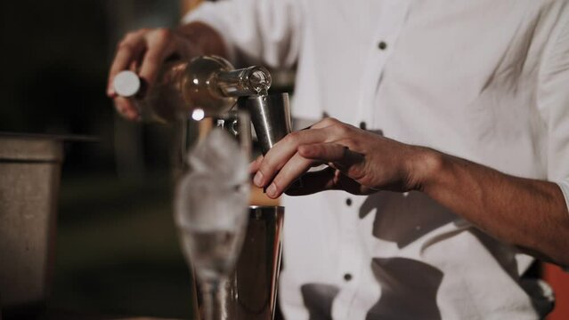 bartender on the street prepares cocktails