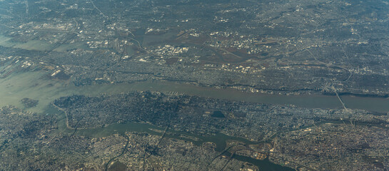 Aerial landscape view of New York City, Jersey City and Manhattan located between Hudson River and East River 
