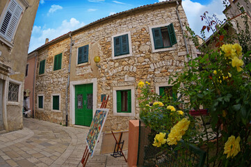 Streets of Porec with calm, colorful building facades in  Croatia, Istria. Traveling concept background - 579497644