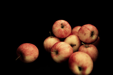 apples on black background