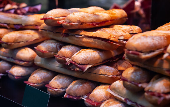 Different spanich sandwich - bocadillo at shop window. High quality photo