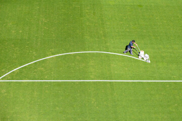 Painting line on a soccer pitch