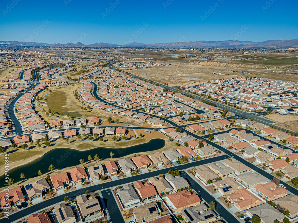 Wall mural apple valley, california – march 3, 2023: aerial city view drone photo toward apple valley californi