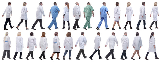 group of doctors in motion isolated on white
