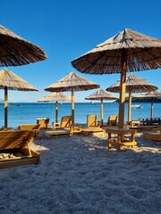 lounge chairs on the beach