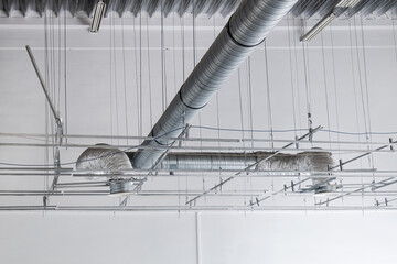 Ventilation and air conditioning shafts on the ceiling in the building