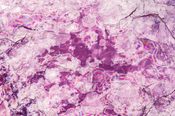 Lepidolite (rose mica). macro detail texture background. close-up raw rough unpolished semi-precious gemstone