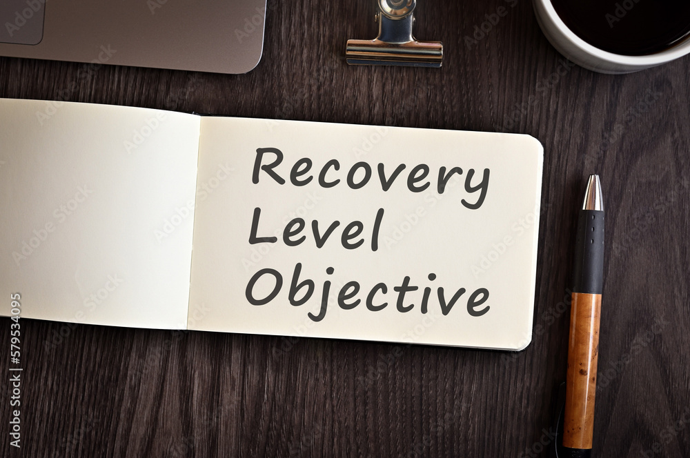 Poster there is notebook with the word recovery level objective. it is an eye-catching image.