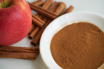 apple and cinnamon sticks  spice close up
