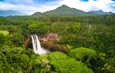 Drone photo of waterfall in the mountains of Kauai 
