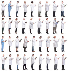 Obraz premium full length group of doctors with notepad isolated