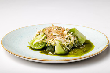 Delicious salad served on a white plate