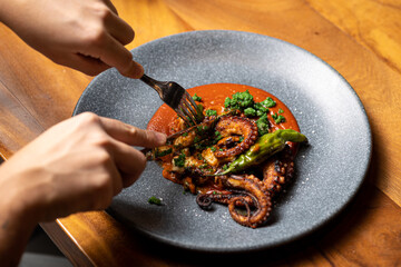 Delicious grilled octopus dish at the luxury restaurant