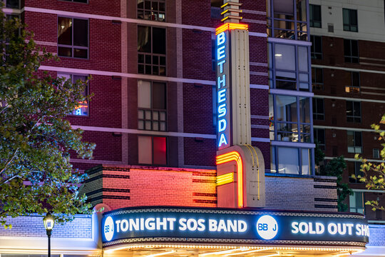 The marquee sign for the Bethesda Blues & Jazz Club (formerly Bethesda Theater Cafe and Bethesda Cinema & Drafthouse) in Bethesda, Maryland, is illuminated, advertising a sold out show.