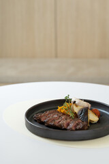 sous-vide striploin steak on table, 채끝 스테이크