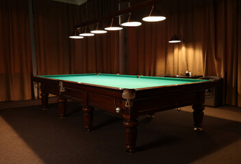 Empty green billiard table in club. Pool Game