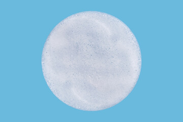 Soap foam on blue background