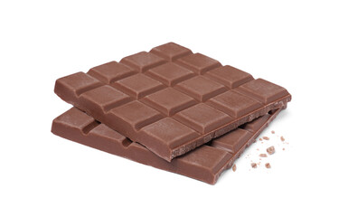 Pieces of tasty milk chocolate bar isolated on white