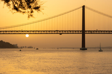 25th of April Bridge - Sunset over Tagus river in Lisbon