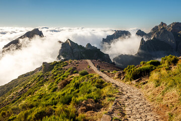 Hiking over Madeira island. The trail around the top mountains on the island - Pico do Arieiro.