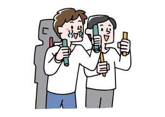 コンサートでペンライトを振る男性　推し活をする人々