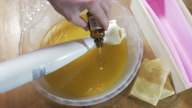 Mixing essential oil into the cold process soap process