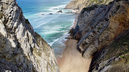 Obraz premium Praia da Adraga beach and rock cliffs of Portuguese coast
