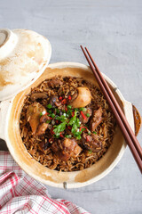 Delicious homemade meals. Claypot Chicken Rice. Healthy fresh ingredients, free range chicken meat, basmati rice, Chinese mushrooms, dried shrimps, black sauce, chili and coriander