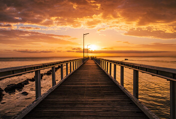 Fototapeta na wymiar The sunrise of Wellington Point Pier in Wellington Point Recreation Reserve in Brisbane