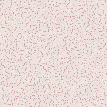 Squiggle pattern on cream background and light brown squiggles